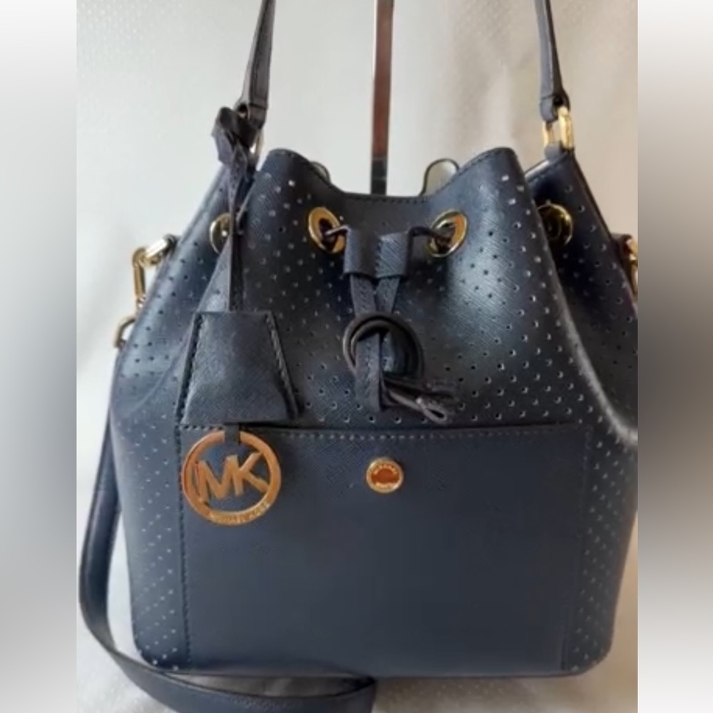 Micheal Kors Navy Blue Perforated Bucket Bag with long strap brand new
